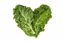 Closeup,Of,Some,Leaves,Of,Kale,Forming,A,Heart,On